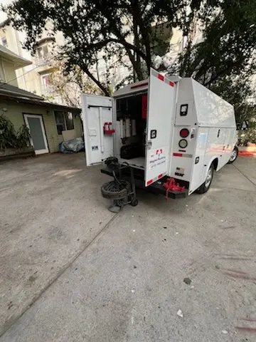 Magnet Plumbing service vehicle on-site for Sewer Line Repair in Spicewood